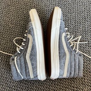 Vans high tops with blue flower design